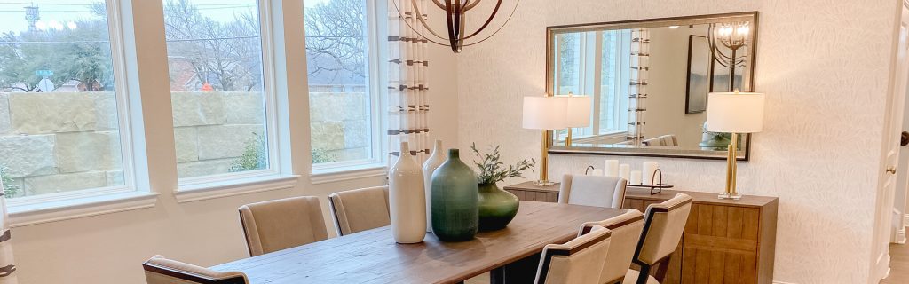 Modern chandelier lighting in a dining room from residential electrical services.